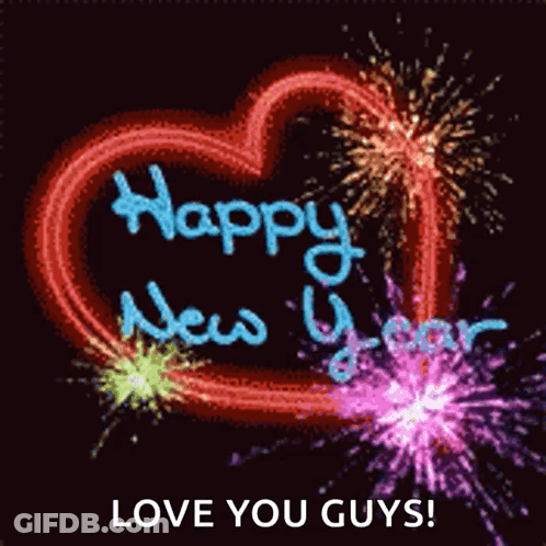 A Heart Shaped Fireworks Display With The Words Happy New Year Written On It GIF