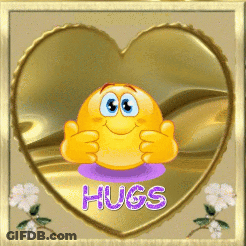 A Heart Shaped Frame With A Smiley Face And The Words Hugs On It GIF