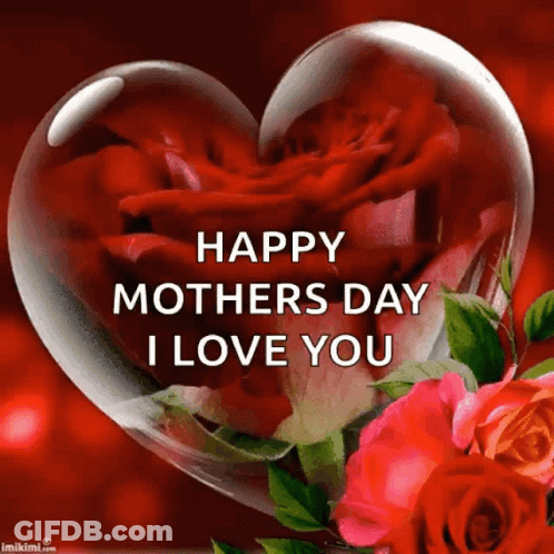 A Heart Shaped Glass Container Filled With Red Roses With The Words Happy Mothers Day I Love You GIF