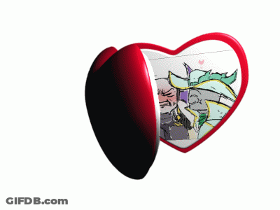 A Heart Shaped Mirror With A Drawing Of A Man And A Unicorn On It GIF