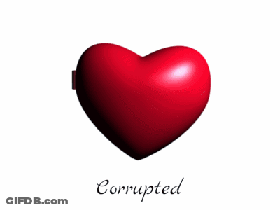 A Heart Shaped Mirror With A Picture Of A Man And The Words Corrupted Below It GIF