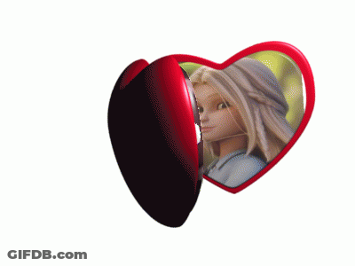 A Heart Shaped Mirror With Two Pictures Of Cartoon Characters GIF