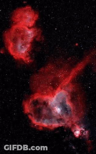 A Heart Shaped Nebula In The Night Sky GIF