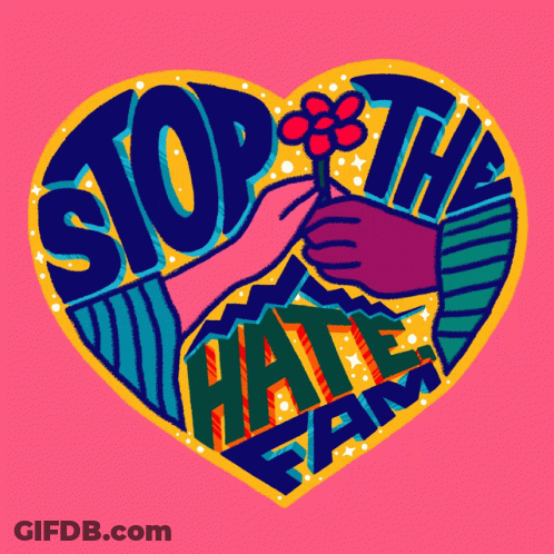 A Heart Shaped Sign That Says Stop The Hate Fam GIF