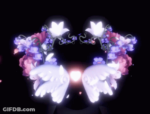 A Heart With Flowers And Wings On It GIF