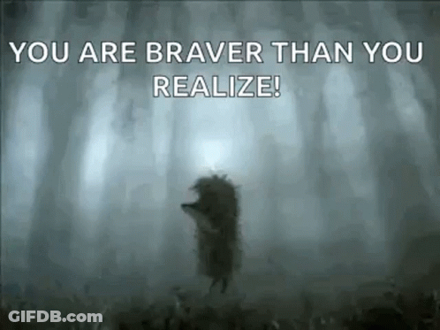 A Hedgehog Is Standing In The Middle Of A Foggy Forest With The Words `` You Are Braver Than You Realize '' . GIF