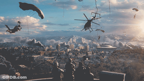 A Helicopter Is Flying Over A City With Parachutes GIF