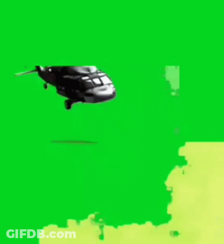 A Helicopter Is Flying Over A Van On A Green Screen GIF