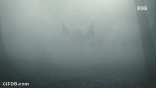 A Helicopter Is Flying Through A Foggy Forest With The Hbo Logo In The Background . GIF