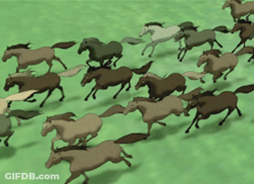 A Herd Of Horses Running In A Field GIF