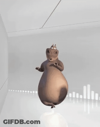 A Hippopotamus Is Dancing In A Room With A White Background . GIF