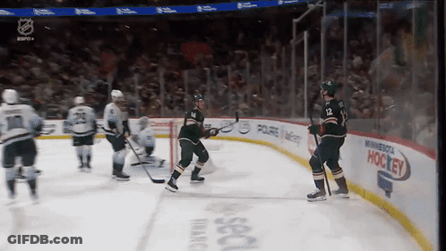 A Hockey Game Being Played In Minnesota GIF