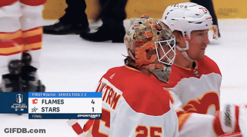 A Hockey Game Between The Flames And The Stars Is Tied 2-2 GIF