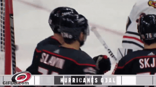 A Hockey Game Between The Hurricanes And Blackhawks GIF