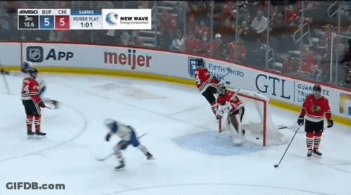 A Hockey Game Between The Sabres And The Blackhawks With A Score Of 5 To 1 GIF
