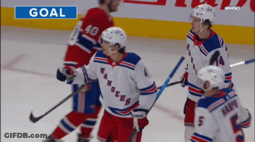 A Hockey Game Is Being Played And The Goal Is Shown On The Screen GIF