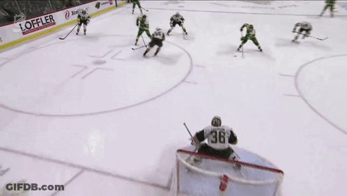 A Hockey Game Is Being Played And The Goalie Has The Number 36 On His Jersey GIF