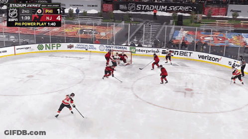 A Hockey Game Is Being Played At The Stadium Series In New Jersey GIF