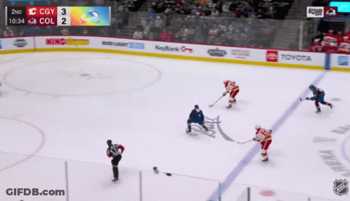 A Hockey Game Is Being Played Between The Cgy And Col Team GIF