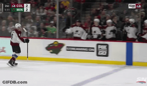 A Hockey Game Is Being Played Between The Colorado Avalanche And The Milwaukee Wild GIF