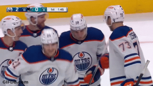 A Hockey Game Is Being Played Between The Edmonton Oilers And The Toronto Maple Leafs GIF