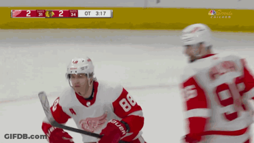 A Hockey Game Is Being Played In Chicago And The Score Is 2 To 34 GIF