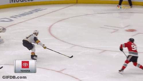 A Hockey Game Is Being Played In Chicago GIF