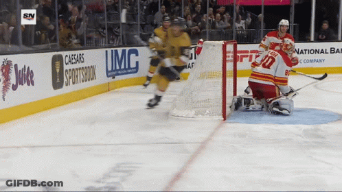 A Hockey Game Is Being Played In Front Of A Banner For Caesars Sportsbook GIF