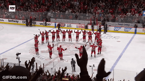 A Hockey Game Is Being Played In Front Of A Crowd With Ads For Sap And Betway On The Boards GIF