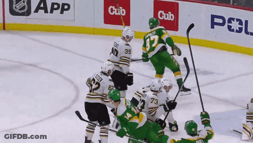A Hockey Game Is Being Played In Front Of A Cub App Banner GIF