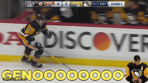 A Hockey Game Is Being Played In Front Of A Discover Ad GIF