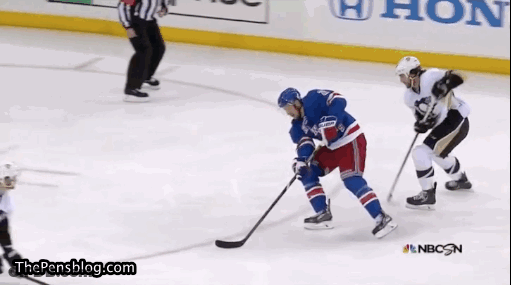 A Hockey Game Is Being Played In Front Of A Nbc Advertisement GIF