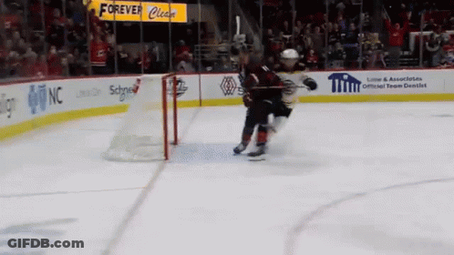 A Hockey Game Is Being Played In Front Of A Sign That Says Forever Cleats GIF
