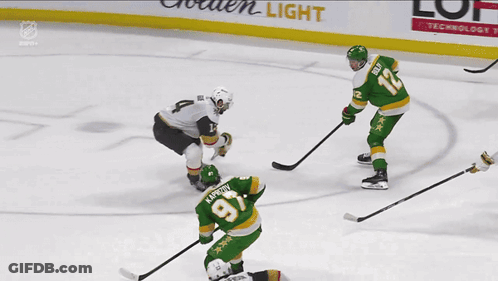 A Hockey Game Is Being Played In Front Of A Us Bank Advertisement GIF