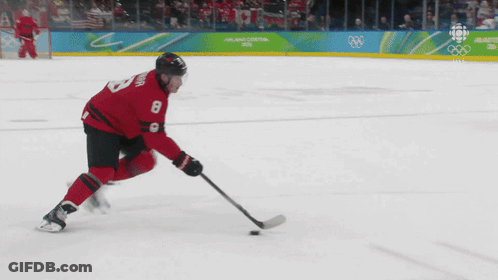 A Hockey Game Is Being Played In The Olympics GIF