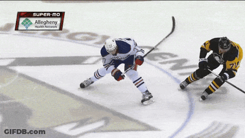 A Hockey Game Is Being Played In The Super-Mo GIF
