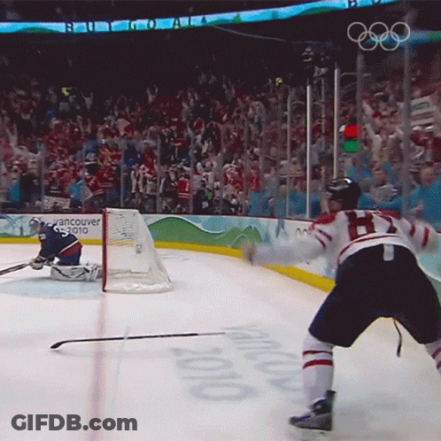 A Hockey Game Is Being Played In Vancouver In 2010 GIF