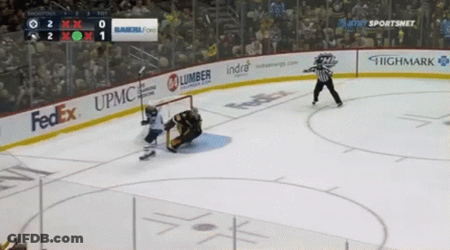 A Hockey Game Is Being Played On A Ice Rink Sponsored By Fedex And Upmc GIF