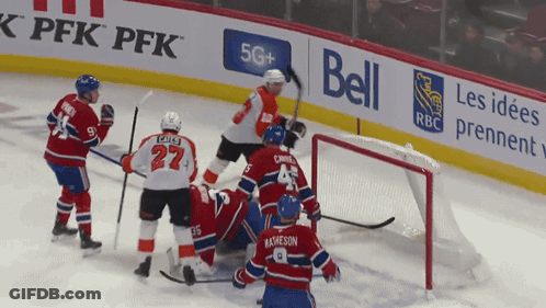 A Hockey Game Is Being Played On A Rink Sponsored By Bell And Rbc GIF