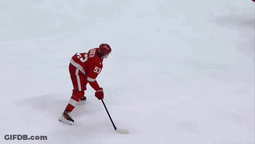 A Hockey Game Is Being Played On A Rink With Advertisements For Belle Tire Xfinity Mobile Labatt And Gallagh Insurance GIF