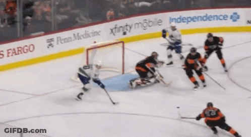 A Hockey Game Is Being Played Sponsored By Penn Medicine Xfinity Mobile And Independence GIF