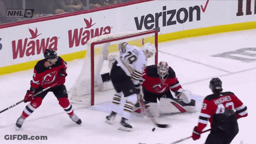 A Hockey Game Is Being Played Sponsored By Verizon GIF