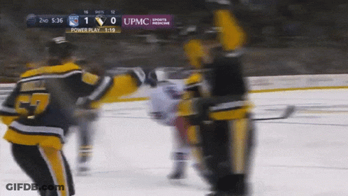 A Hockey Game Is Being Played With A Score Of 1 To 0 GIF