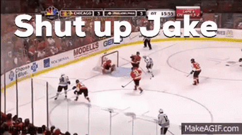 A Hockey Game Is Being Played With The Words Shut Up Jake Written On The Ice GIF
