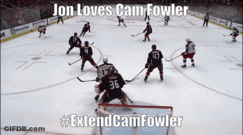 A Hockey Game With Jon Loves Cam Fowler Written In The Corner GIF