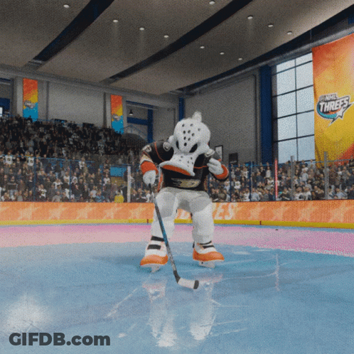 A Hockey Mascot Is Holding A Puck In Front Of A Banner That Says ' The Northwest Threes ' GIF