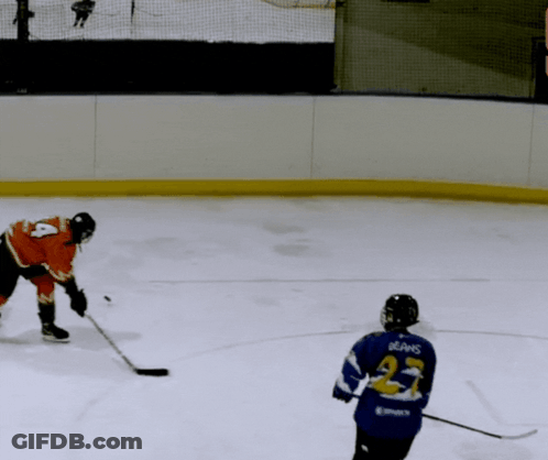 A Hockey Player In A Blue Jersey With The Number 21 On It GIF