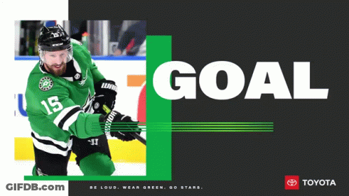 A Hockey Player In A Green Jersey With The Number 15 GIF