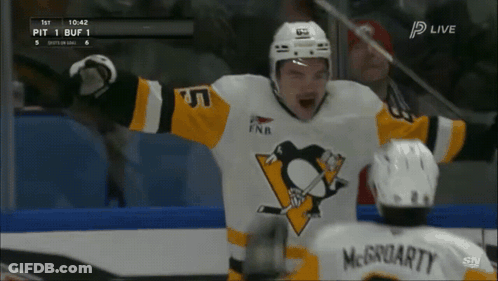 A Hockey Player In A Pittsburgh Penguins Jersey Celebrates His Goal GIF
