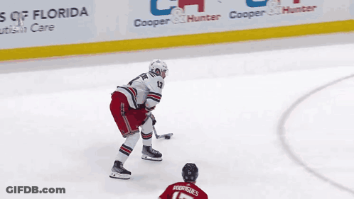 A Hockey Player In A Red Jersey With Rodriguez On The Back GIF